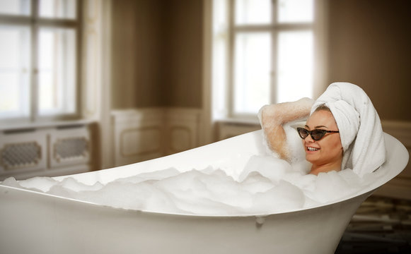Luxury interior and slim young woman in white bath. 