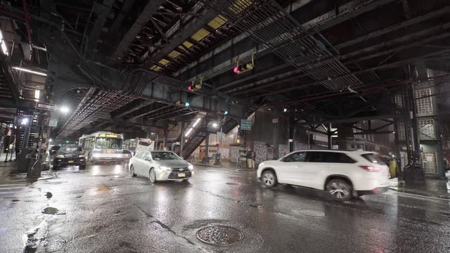 Rainy Crossroad With Traffic at Night in Brooklyn