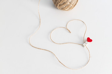 Heart shaped rope on white background. Valentine's Day