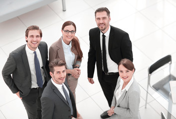 group of business people standing in a Bank office