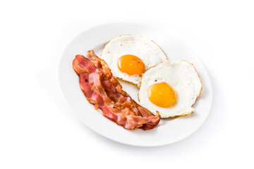 Fried eggs and bacon for breakfast isolated on white background. 