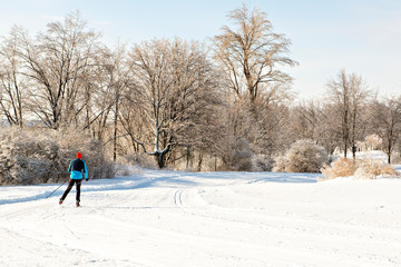 A man practicing nordic skiing in winter season