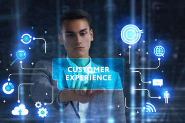 The concept of business, technology, the Internet and the network. A young entrepreneur working on a virtual screen of the future and sees the inscription: Customer experience
