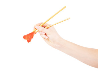 chopsticks in hand on a white background