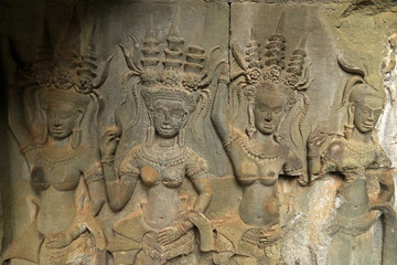 Fototapeta na wymiar Devatas on Angkor Wat, Cambodia