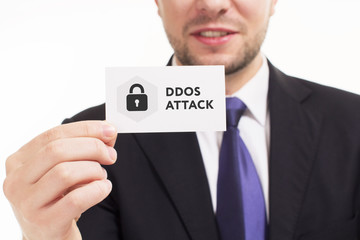 Business, technology, internet and networking concept. Young entrepreneur showing keyword: Ddos attack