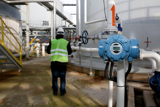 Pressure gauge at gas plant - measuring gas pressure - pipe and valve