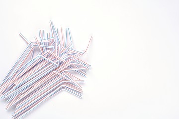 Obraz na płótnie Canvas white plastic drinking straw