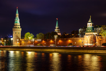 Obraz premium View of Moskva river on a background of Moscow Kremlin towers with night illumination