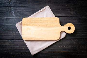 empty cutting wooden board with kitchen cloth