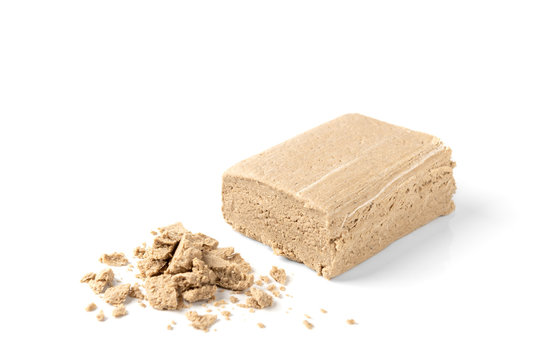 Sunflower halva isolated on white background. 