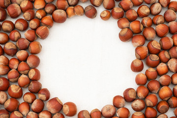 brown hazelnut laid out throughout the frame. Inside there is a free round space for text