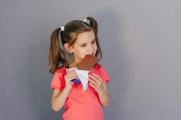 Sweet tooth baby chocolate. Healthy and harmful food in baby food. Selective focus.
