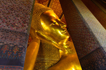 Reclining Buddha gold statue at Wat Pho, Bangkok