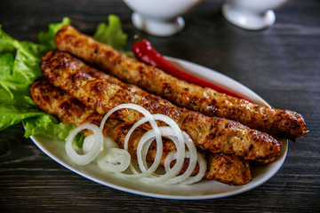 grilled steak with french fries and vegetables