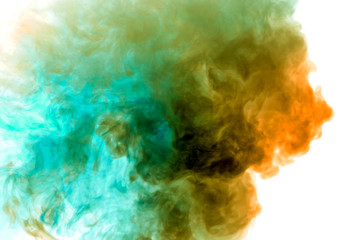 Fototapeta na wymiar A thick column of smoke rises up as a cloud exhaled from a vape on a white background is highlighted in yellow and blue color.