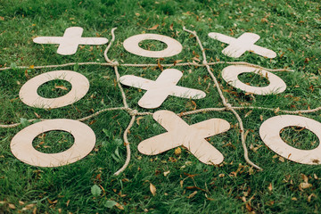 tic tac toe game outside grass season