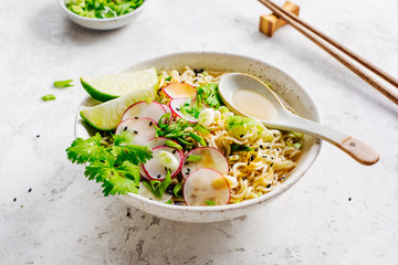 Bowls with Asian soup Ramen