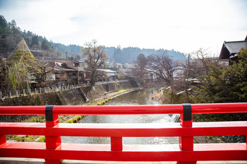 Fototapeta premium Nakabashi Bridge with red colour is one of the symbols of Hida-Takayama old town in Chubu region, Japan