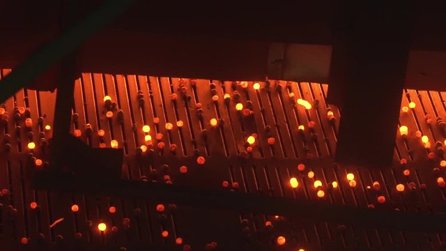 Iron pellets burn in a blast furnace