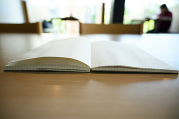 Grid book on the wood table