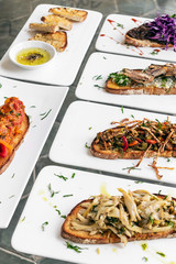 portuguese tiborna toasted open sandwich tapas snacks on table