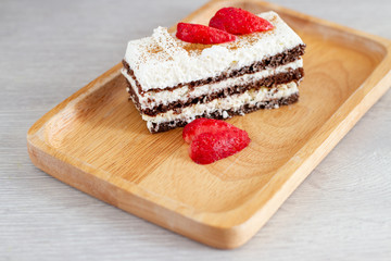 piece of cake on wooden background