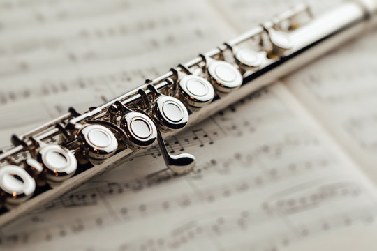transverse flute on music sheet