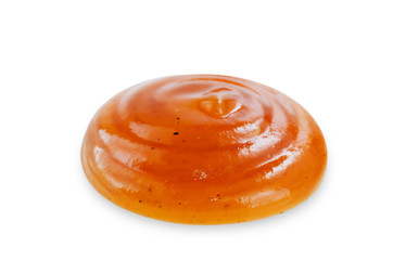 Drop of sweet and sour sauce on a white background