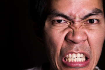 A portrait of crazing man because he doesn't get what he wants. Angry emotion is represent serious, terrible and negative emotion. His age is 36 years old.