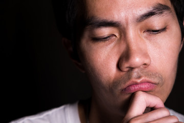 Obraz premium A portrait of a man is thinking about his work. Thinking represent of intelligence, expertise and smart. His age is 36 years old.