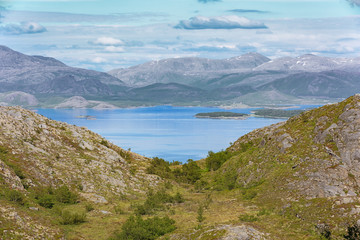 Fototapeta na wymiar Looking in the direction of Bronnoysund from the eastern entrance of the tunnel through Torghatten mountain