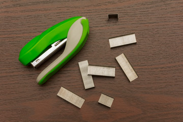 stapler with a set of metal staples