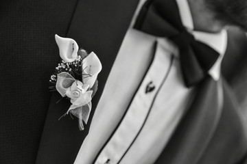 groom and bride with wedding bouquet