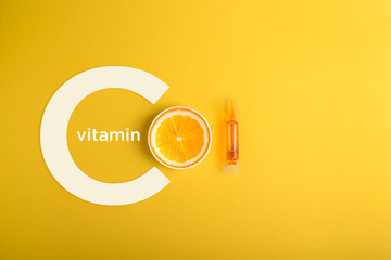 Immunity protection concept, antiviral prevention Serum and cosmetics with vitamin C.  Essential oil from citrus fruits. - obrazy, fototapety, plakaty