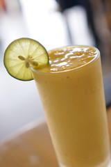 Fresh mango juice smoothies in a glass