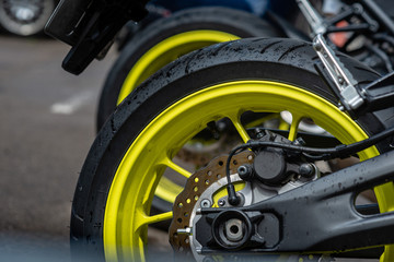 Closeup detail of motorcycle rear wheels and brake disc - Image