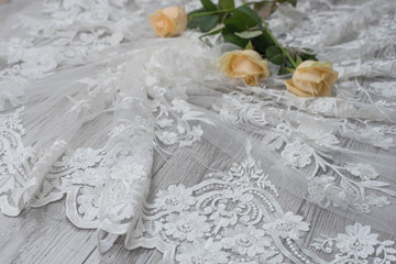 The texture of lace on wooden background