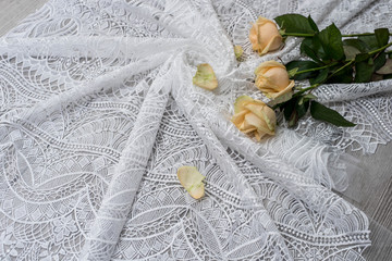 The texture of lace on wooden background