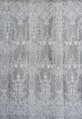 The texture of lace on wooden background