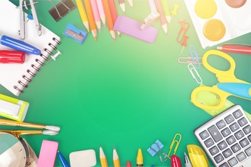Assortment  of School supplies on  background