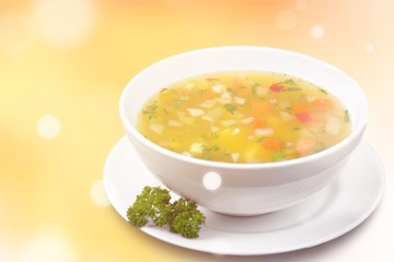 Vegetable soup isolated on a white background