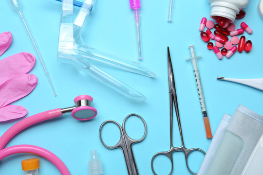 Different medical objects on color background, flat lay
