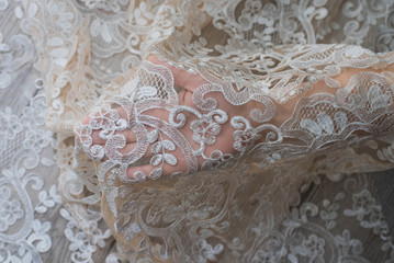 The texture of lace on wooden background