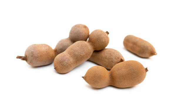 Ripe sweet tamarind isolated on white background