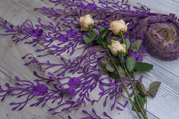 The texture of lace on wooden background