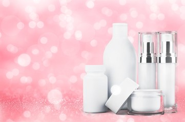 Cosmetic containers isolated on background