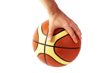 Fototapeta premium Hand holds basketball ball isolated on white background