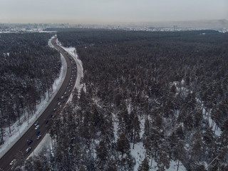 Aerial view of a road in winter landscape