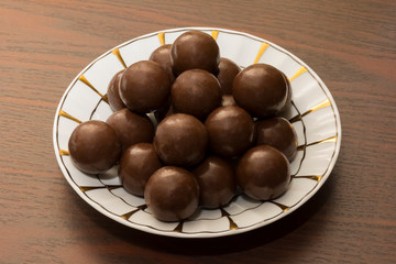 chocolate candy on a saucer